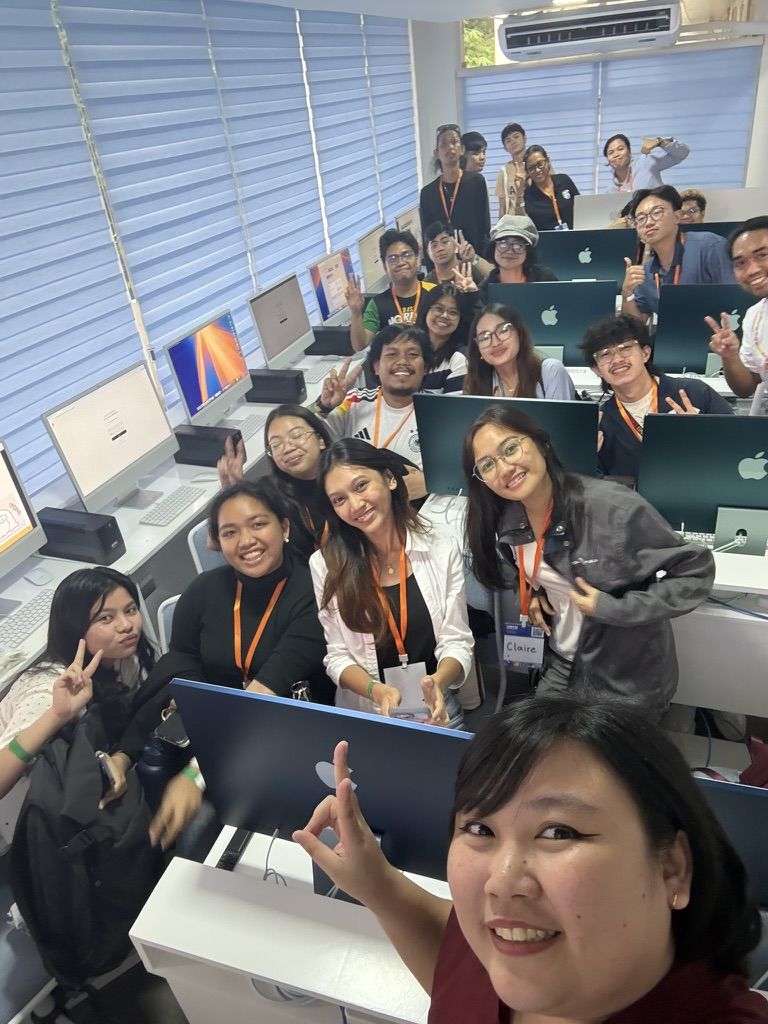 This room was very cramped but we made do, 2nd out of 3 wide angle selfies I took with my workshop participants! This is from Cebu leg 😁 Chi doing a wide angle selfie with the attendees of her workshop while at UXPH Mini 2025: Cebu in a small classroom that was fully seated.