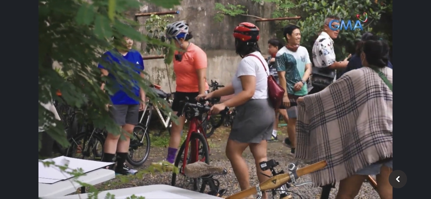 snippet from the I-Witness documentary, entitled Trip to Pasig, where Chi and her other fellow bike commuters are seen arriving at Manila Boat Club, which is situated next to Pasig River, and are parking their bikes near the wall and around the open space.